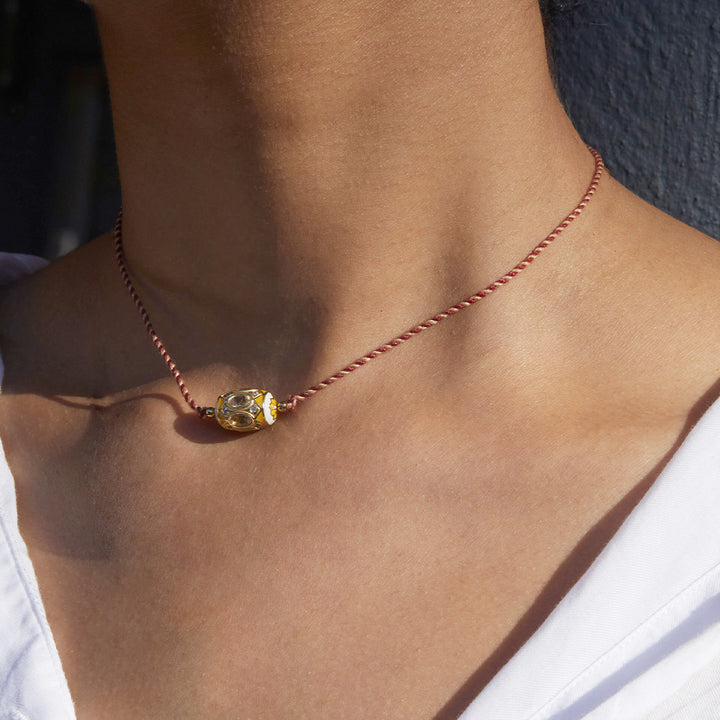 Oshun fil bicolor Collier
