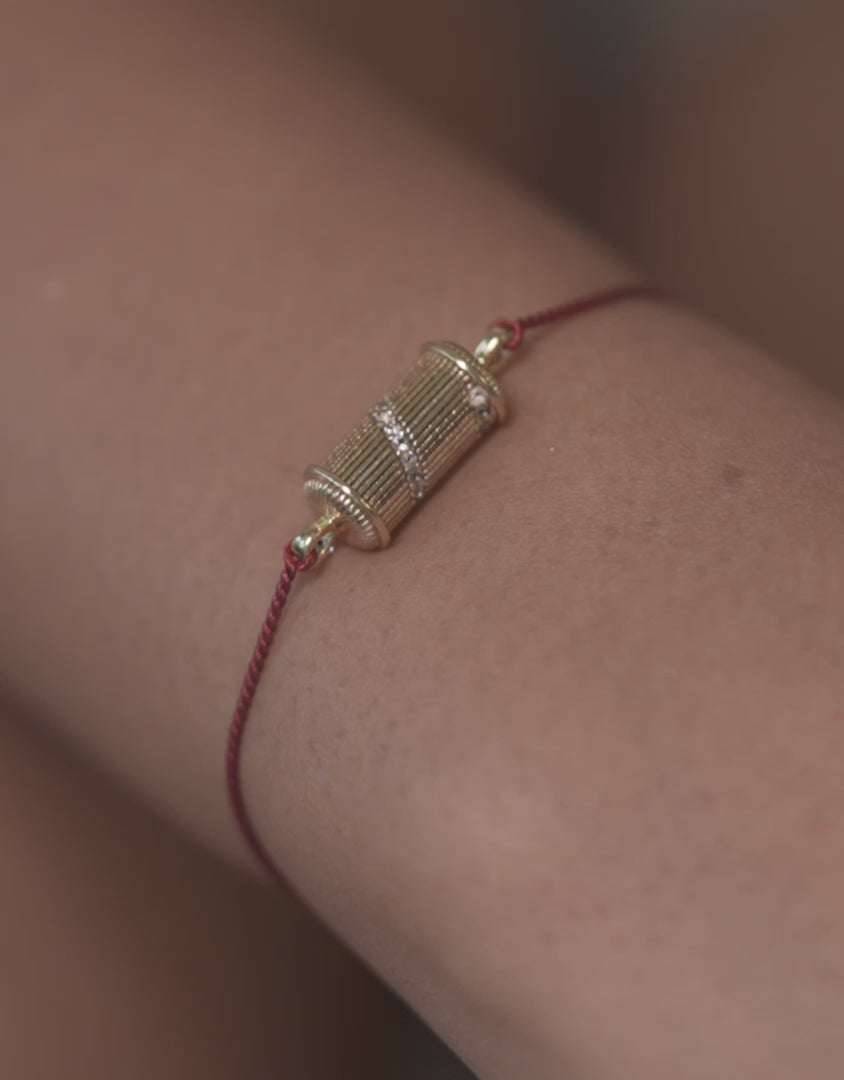 Armband Tabiz Spirale Weißer Topas Roter Faden